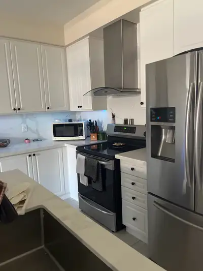 2 bedrooms with bath for rent in a house shared kitchen
