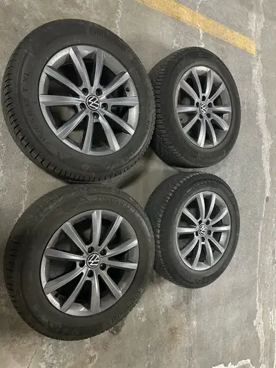 Selling a set of 4 Volkswagen original winter tires mounted on OEM alloy rims. Details: - Tire brand...