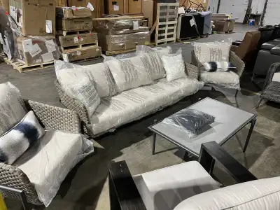 Patio sofa, matching chairs and coffee table, $1,750