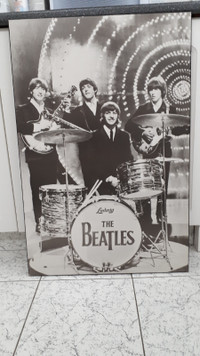 Mounted vintage Beatles poster