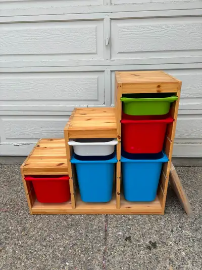 IKEA Trofast pine storage unit that is great for storing kids toys. Includes 6 bins (2 large blue bi...