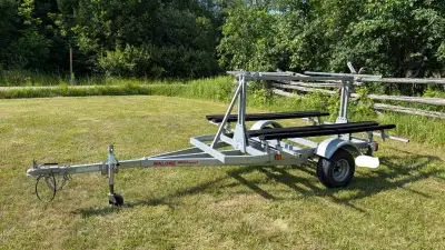 Malone MegaSport LowBed Kayak Trailer + 2 Large Kayak Bunk Kits. In good condition, minor wear. Reta...