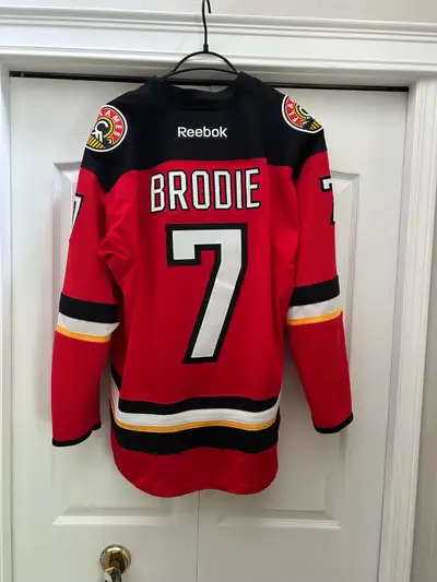 $150 obo. Like new TJ Brodie Calgary flames jersey. Size adult Large. Used, fantastic condition, ful...