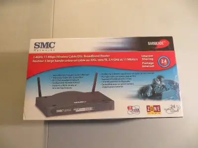 NEW SMC BROADBAND ROUTER, STILL SEALED IN THE BOX & NEVER BEEN OPENED. 2.4 GHZ, $ 20.00