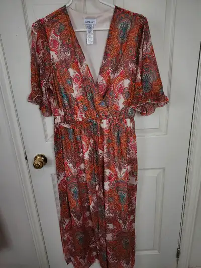 Colorful size 12 dress with sash. New never worn.