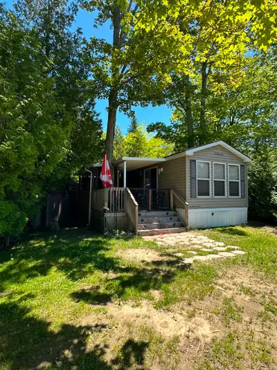 Your Cottage at the Campground is Waiting! A big price reduction means this beautiful park model is...