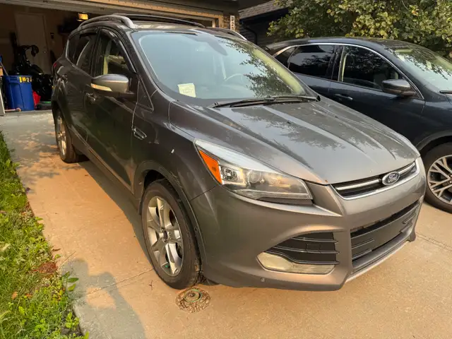 2014 Ford Escape Titanium **Rear left damage**526224465950167049