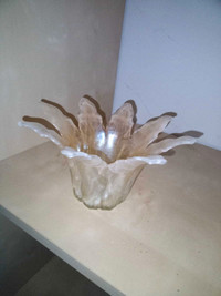 Glass vase that looks a little like  mother of pearl.