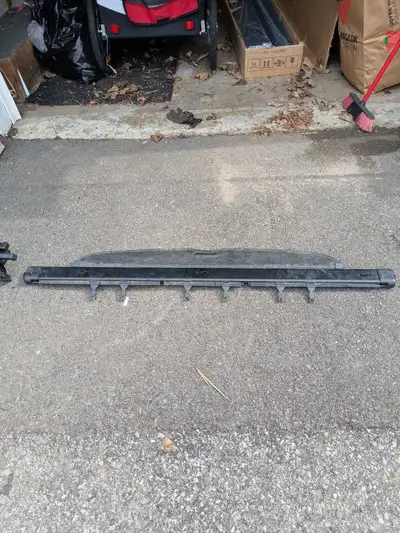 Trunk cover for 2013(ish) Honda CRV. It came with our car but I have never used it. It works fine, I...