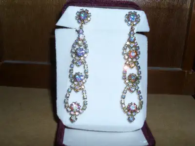 These beautiful dangle earrings are marked/signed/stamped Sherman Please see pictures for size and d...