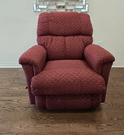 Beautiful lazboy recliner,burgundy colour fabric, removable back, from clean home.