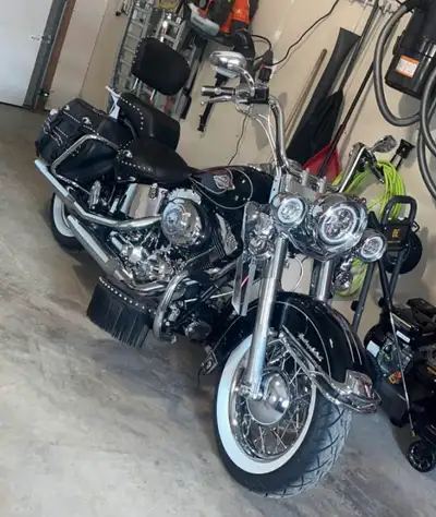 Gorgeous Heritage Softail ready to hit the road! Fully decked out in chrome and accessories Detachab...