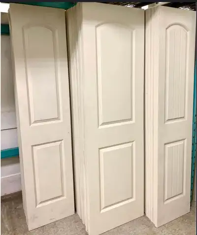 Primed 2 Panel Arch Smooth and Planked Interior Slab Doors Available sizes smooth & planked: 18x80 2...