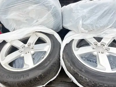 Selling the AUDI rims with tire that I had on my Audi Q5