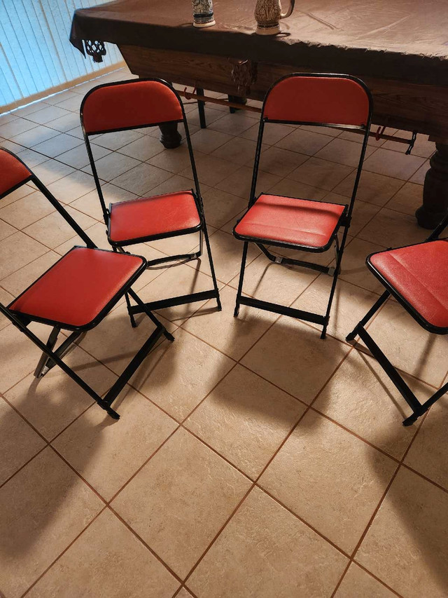 Folding chairs x 4 in Chairs & Recliners in Barrie
