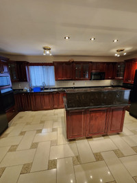 Selling wood kitchen and granite countertops