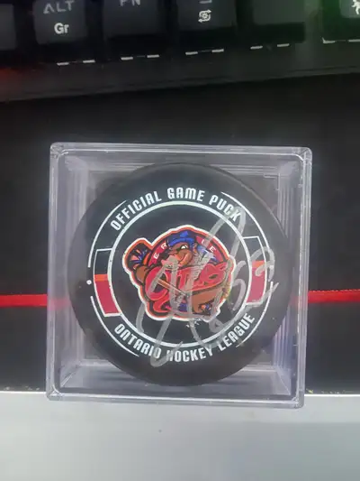 Erie Otters Official game used hockey puck signed by Connor McDavid was given to me by Erie Otters C...