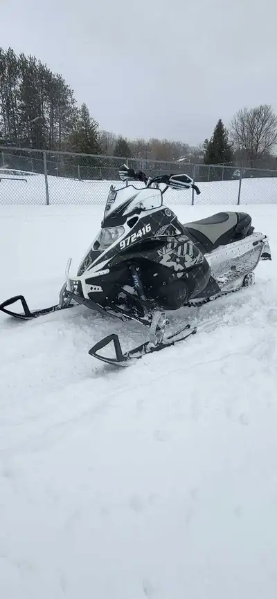 2008 4 stroke yamaha just hit 10000km this winter runs great, the track,studs,jack shaft and drive s...