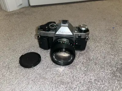 Canon AE-1 Program, 50mm f1.4 prime lens, Black flash, View more