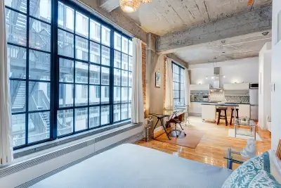 Beautiful fully furnished industrial-style loft in the Unity 1 building, ideally located between Old...
