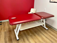 Massage table - manual adjustable, solid metal frame.