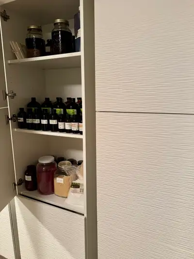 Modern, white storage/closet/kitchen/office unit with textured wave doors and shelves. - ONLY 1 avai...