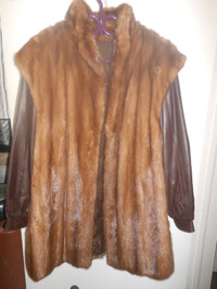 Real fur coat with leather sleeves