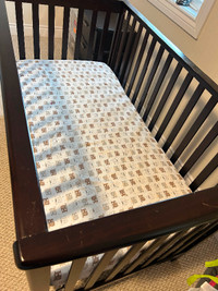 Child craft crib with mattress