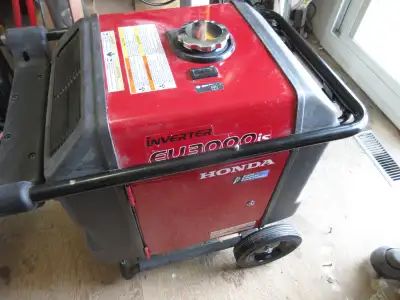 Honda EU3000is Generator, NEW, Less than 1 hr running time, With O.E.M Wheel kit, purchased from Jac...