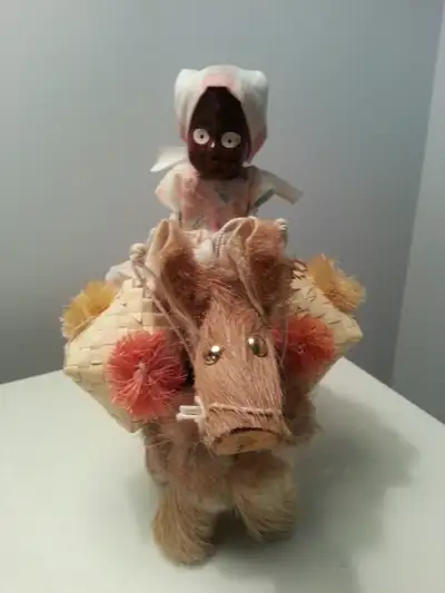 Doll on Donkey Figurine, View more