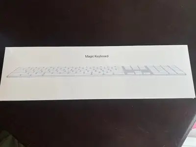 Still in original unopened packaging. White keyboard