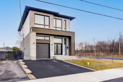 This beautiful detached house built in 2022 in 2 floors features a bright open-concept layout with a...