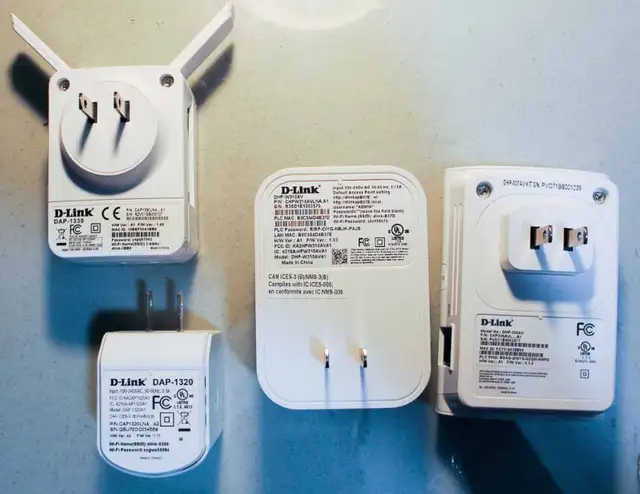 A set of D-Link range extenders and power line networking units in Networking in Cambridge - Image 3