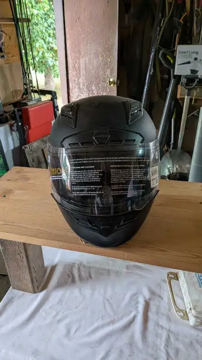 This is an Axiom full face fibreglass helmet, offering reliable protection and a sleek design for mo...