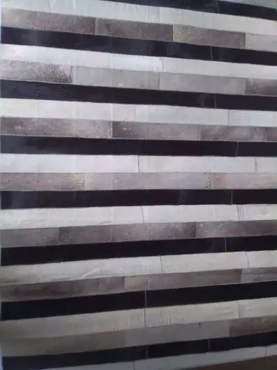 Cowhide patchwork rug, View more