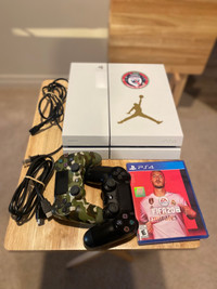 PS4 + 2 controllers + free fife 2020
