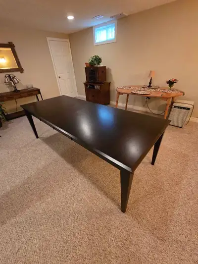 solid wood dining table., View more