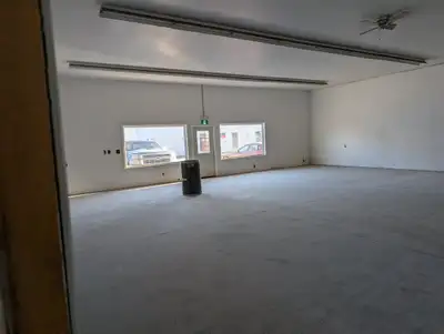 Prime opportunity in the heart of busy Stirling! ✔ 2,000 sq ft open warehouse space ✔ 12' ceilings –...