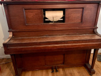 Player Piano with playing rolls 