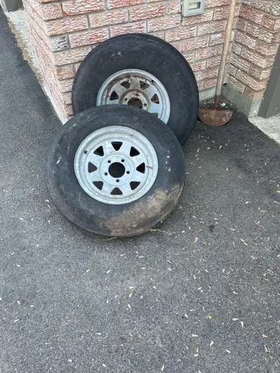15” galvanized metal rims off boat trailer. Replaced them for new tires and rims. $15 for both obo.
