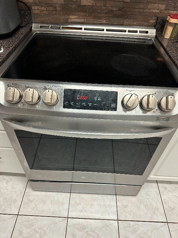 Stainless steel stove glass top self clean asking 600 obo in Stoves, Ovens & Ranges in Hamilton