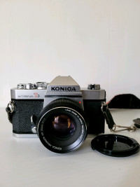 Konica Autoreflex T3 SLR 35mm Film Camera W/  50mm F/1 .7 Lens. 