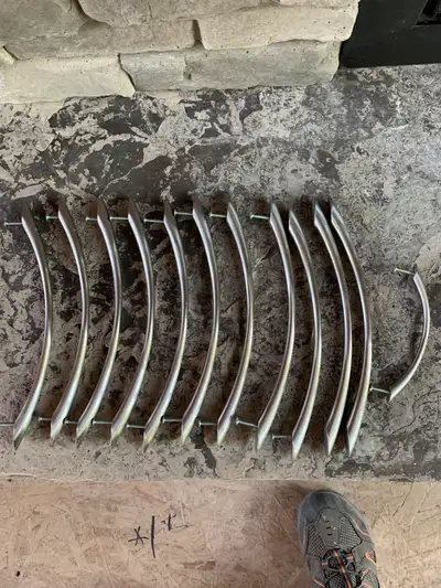 13 large stainless pulls in brushed nickel finish 1 small. Used on display kitchen I picked up. All...