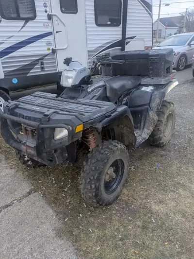 I'm selling a used Polaris ATV 500 HO runs and drives but needs work no papers 2000$ obo