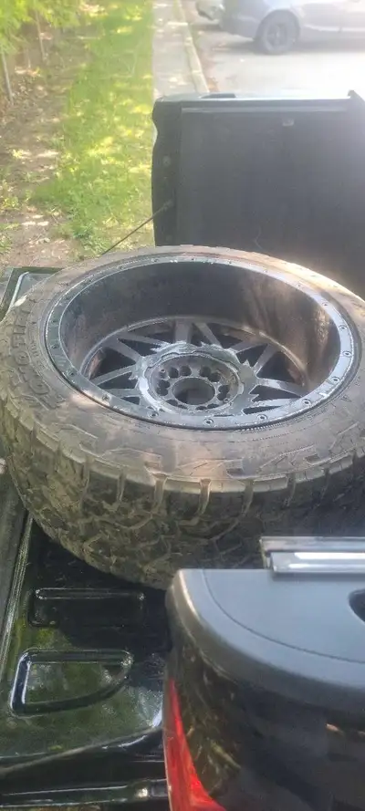 Got these rims with a new truck purchase. 35 x 12.5 on 22" rims. I don't drive with oversized rims....