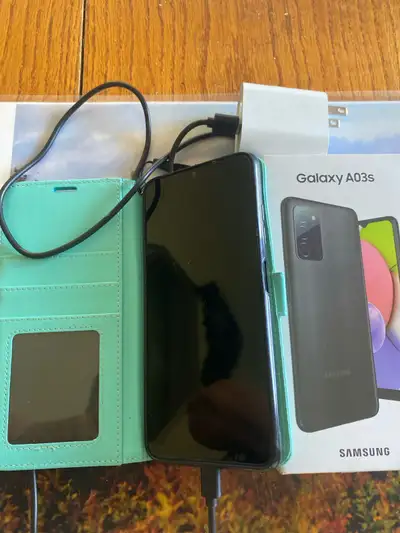 Samsung cell phone for sale with the case and the plug-in, View more