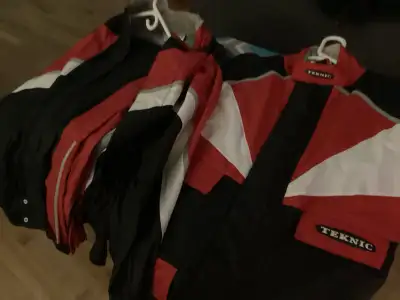 Two rain suits, View more