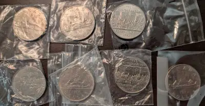 Original 'loonie'.  Canadian dollar coins. Circulated., View more