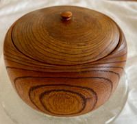 An artisan turned wooden trinket box in exotic wood