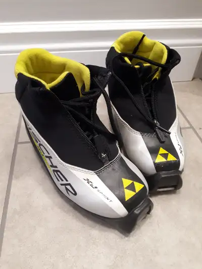 Selling kids Fischer cross country ski boots. SNS profile, size 32. Pick up in Orleans from smoke an...